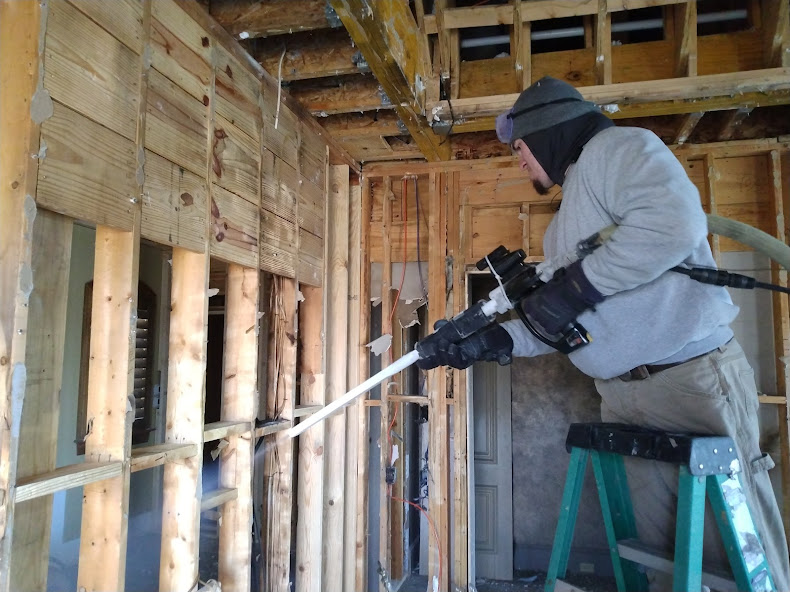 Removing smoke and soot from wood framing after fire damage. Tennessee